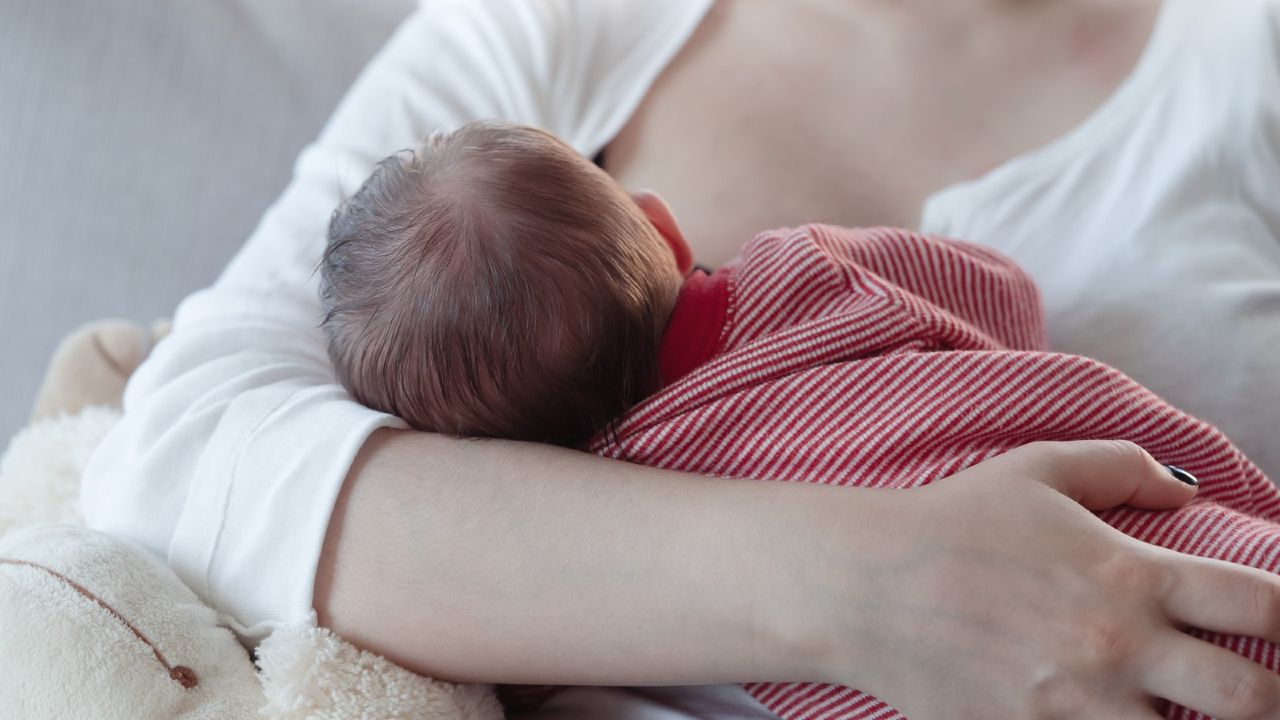 Mum breastfeeding baby