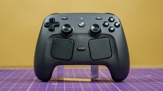 The Steam Controller on a desk.