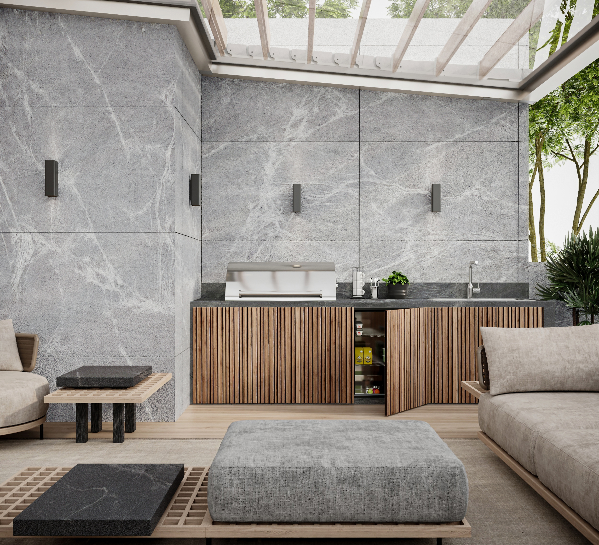 A semi-outdoor space with seating and a grill set up in the corner of the room