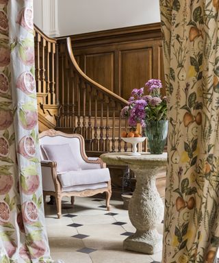 Fruit motif printed curtains in a country home