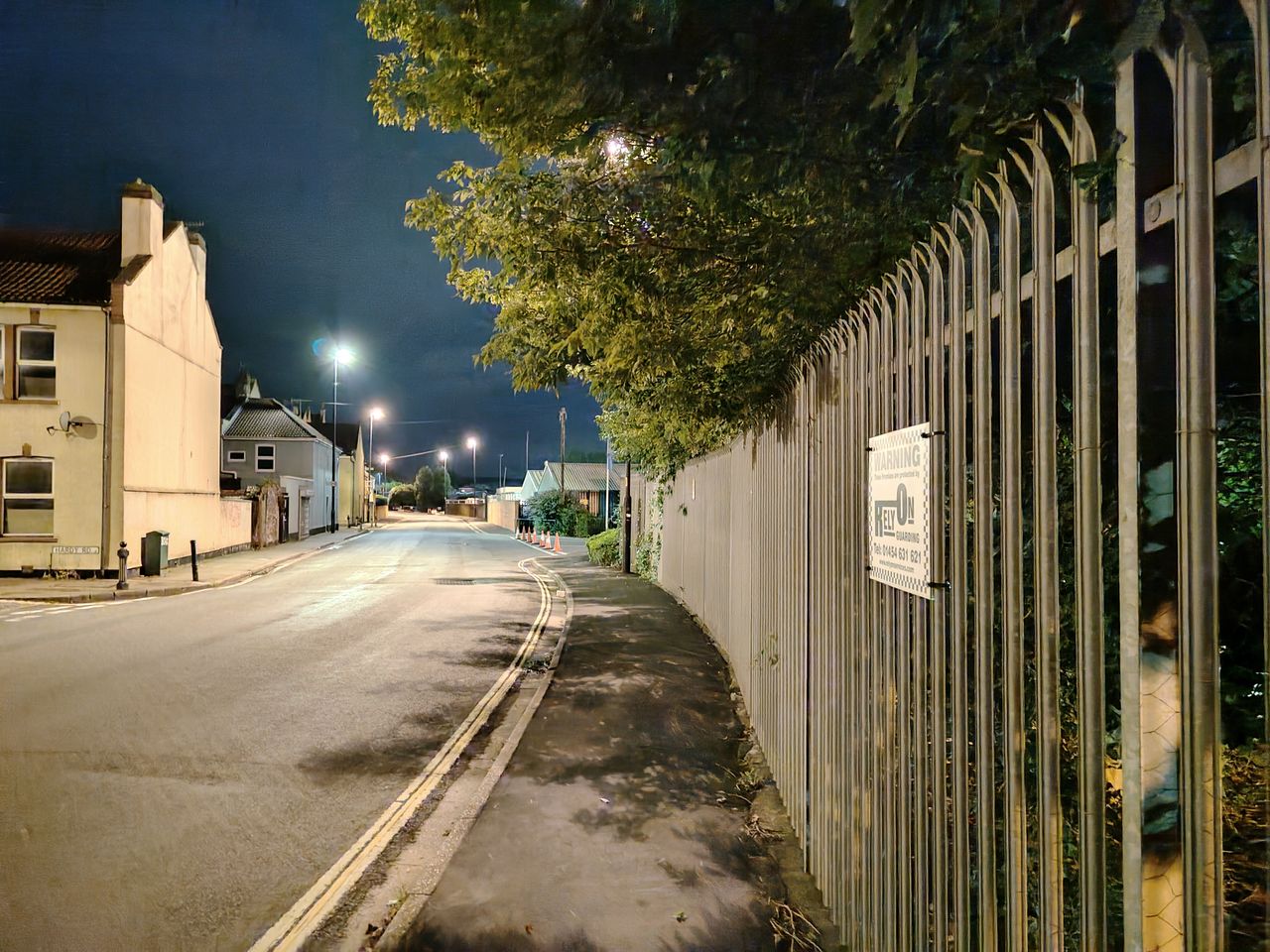 An image of a road at night
