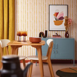 Dining room with wavy striped wallpaper