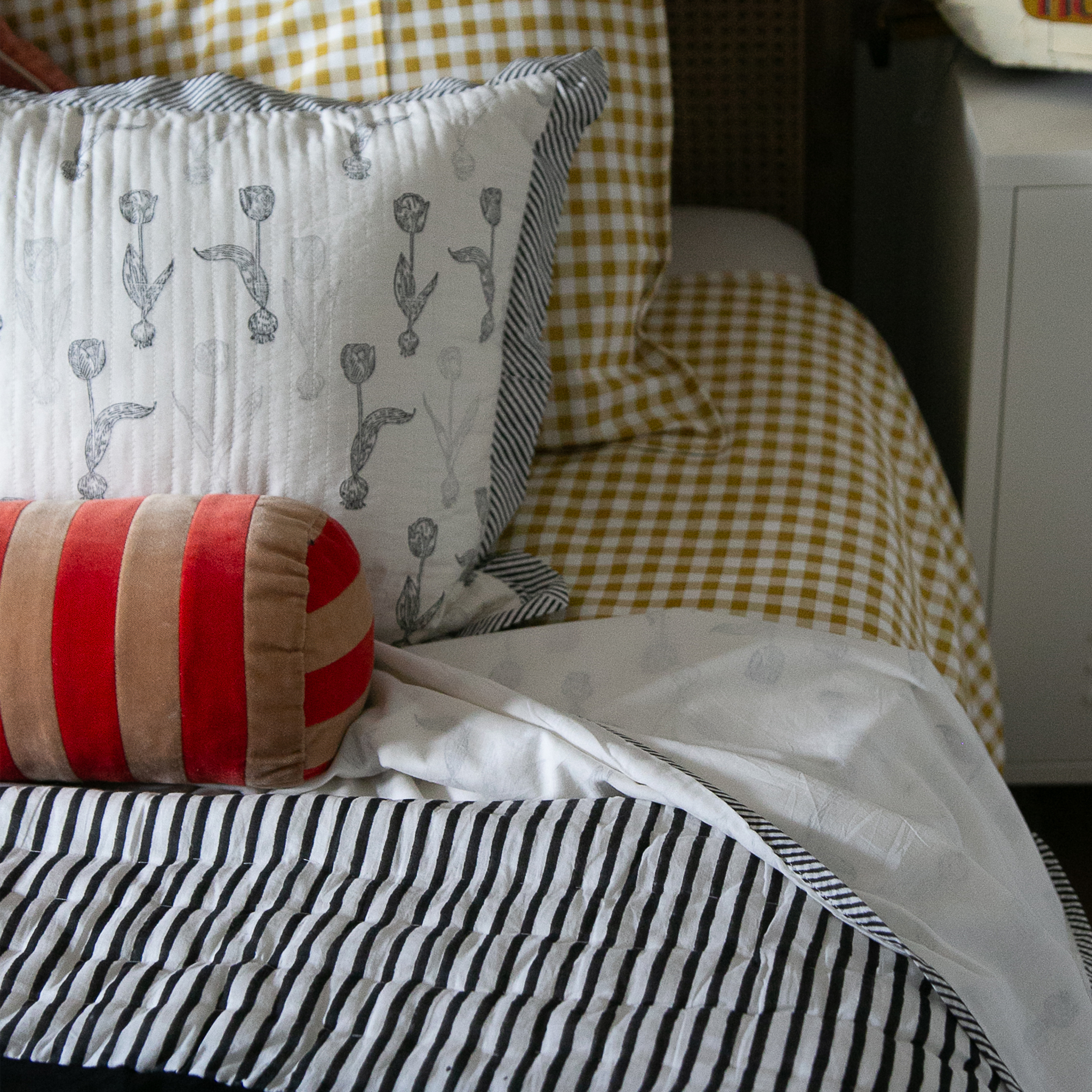 An Indian Dohar blanket on a bed