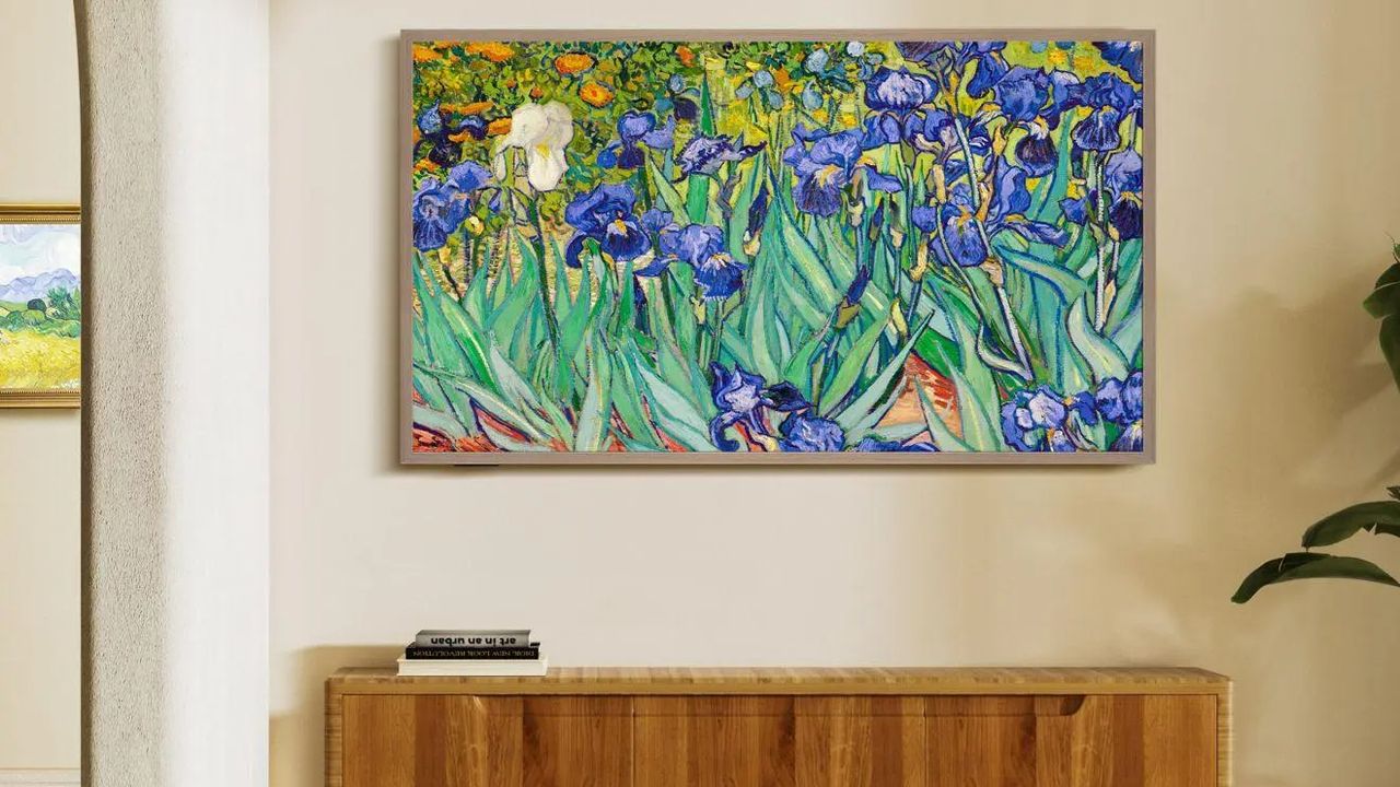 Lifestyle image of Hisense Canvas TV S7N situated in a living room, displaying art