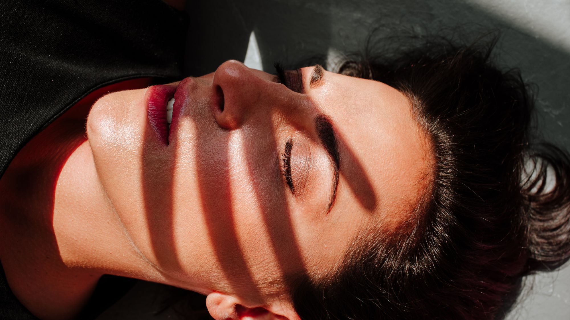 Woman with a shadow on her face
