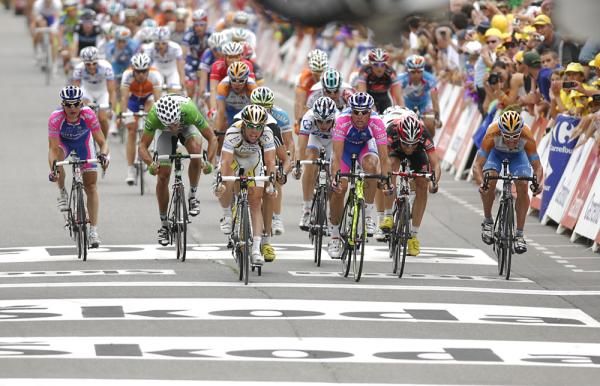 Mark Cavendish (HTC-Columbia) wins the bunch sprint for second.