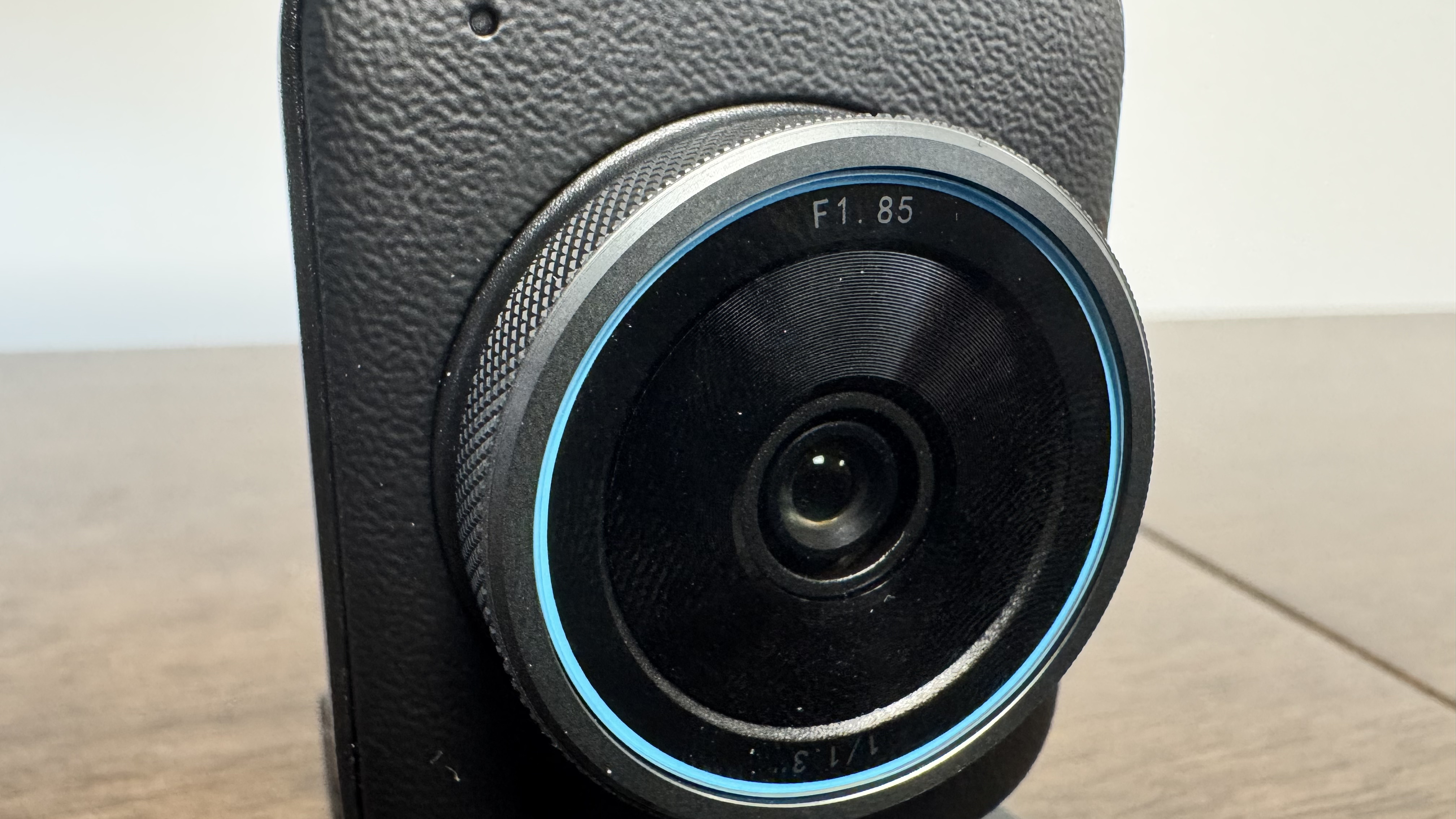 The Yololiv YoloCam S3 4K webcam from upfront on a wooden table