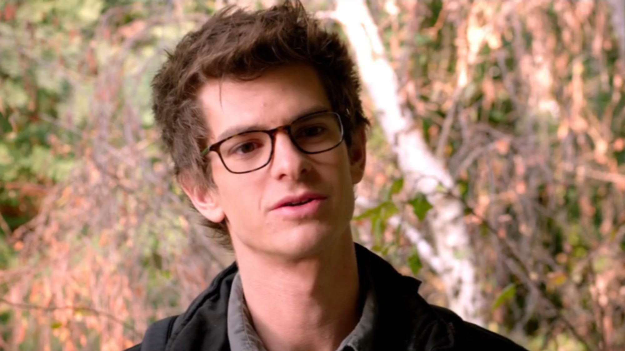 Andrew Garfield wearing glasses as Peter Parker in The Amazing Spider-Man.