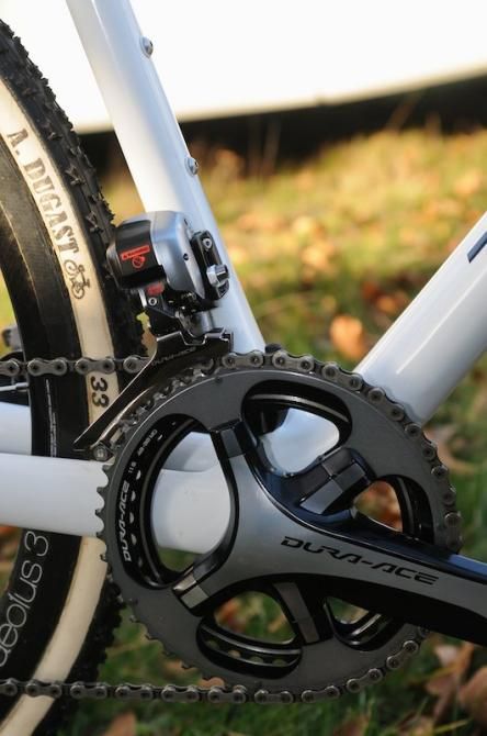 Driveside view of the chainset, Di2 front mech, and bottle cage bosses on the frame