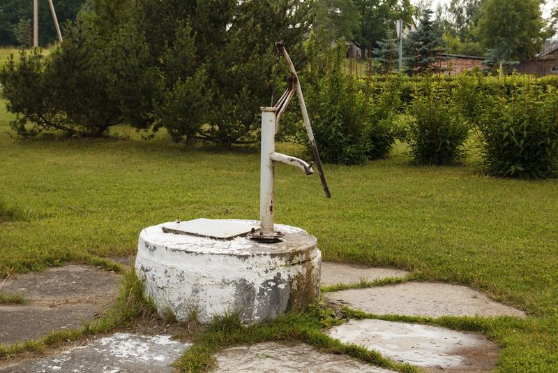 Water well and pump.