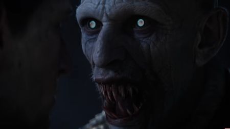 A close-up of the vampire Brencis, showing his teeth during the trailer for The Blood of Dawnwalker. 