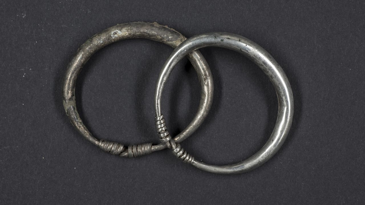 two silver bracelets