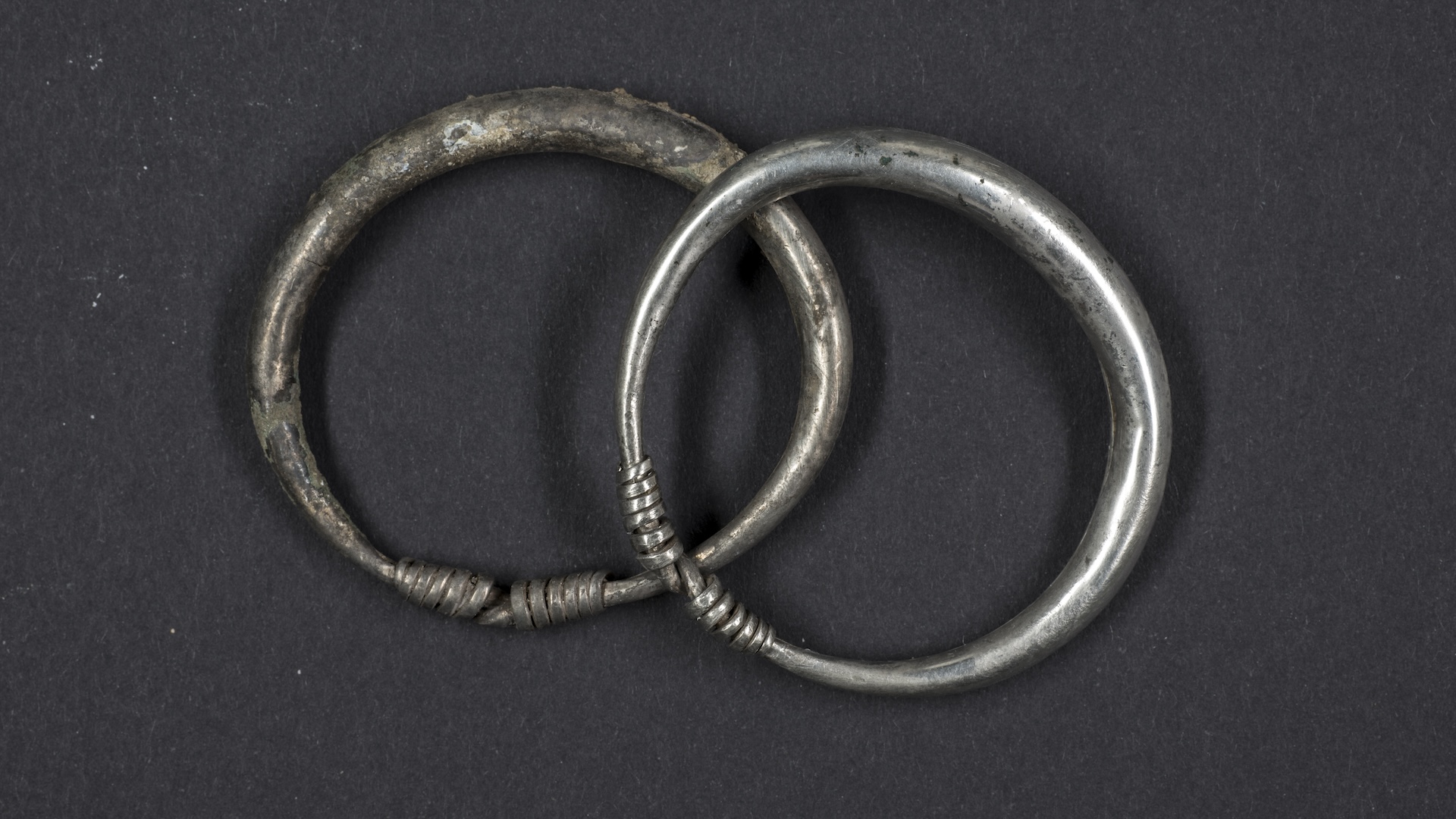two silver bracelets