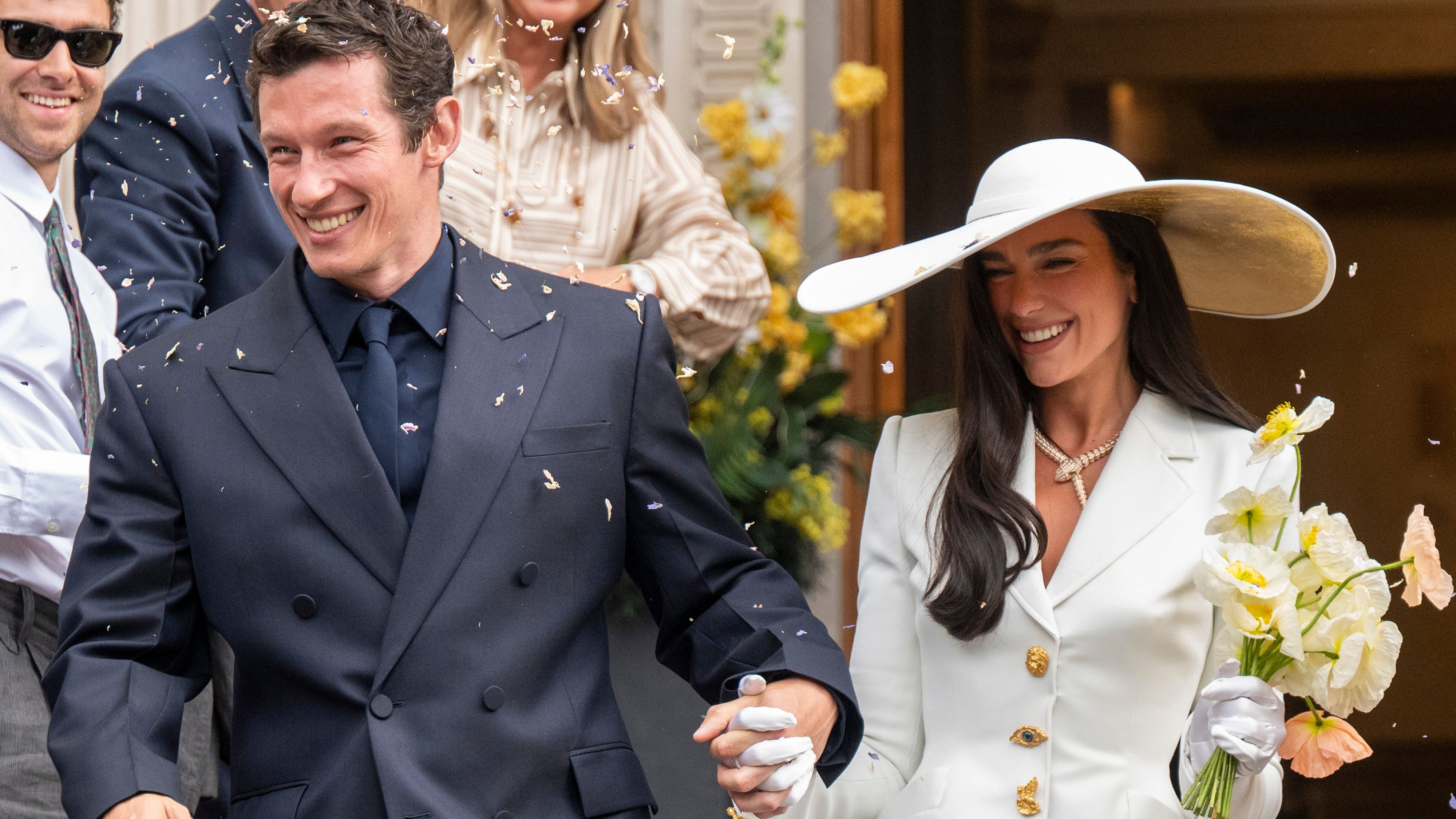 Dua Lipa wears bridal hat to her 2026 wedding to Callum Turner in London.