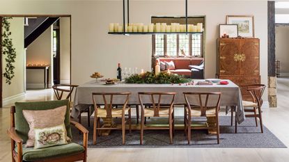 festive dining table with candles and closet