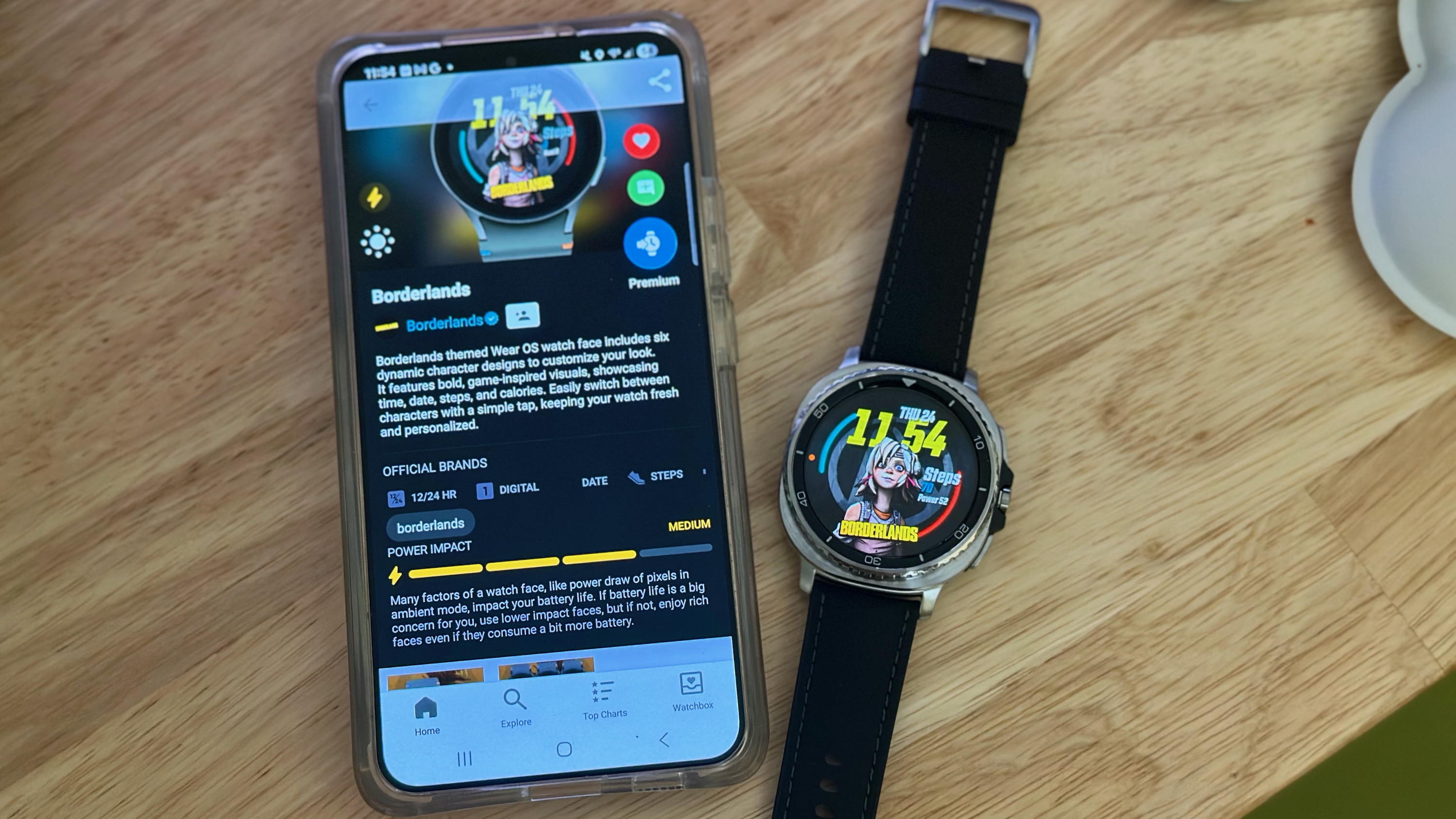 The Samsung Galaxy Watch 8 Classic showing a custom Borderlands watch face from Facer, sitting next to a Galaxy phone showing the Facer app, with information about the watch face's "Power Impact" and ambient mode look.