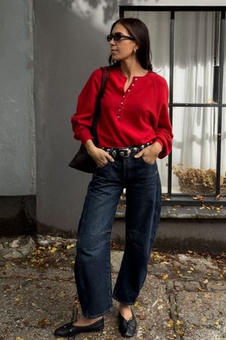 Jessica Skye wearing barrel jeans and a cosy knit