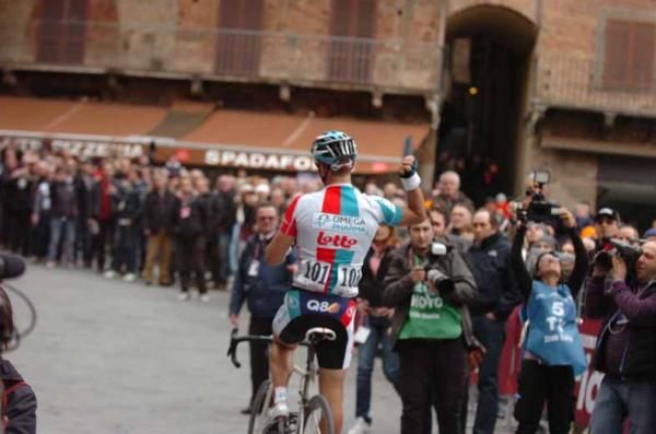 Philippe Gilbert (Omega Pharma-Lotto) basks in the glory of the Piazza del Campo.