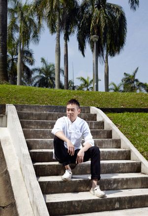 photograph of young chef on steps