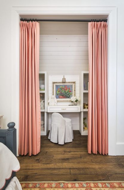 kids desk area in alcove with curtains