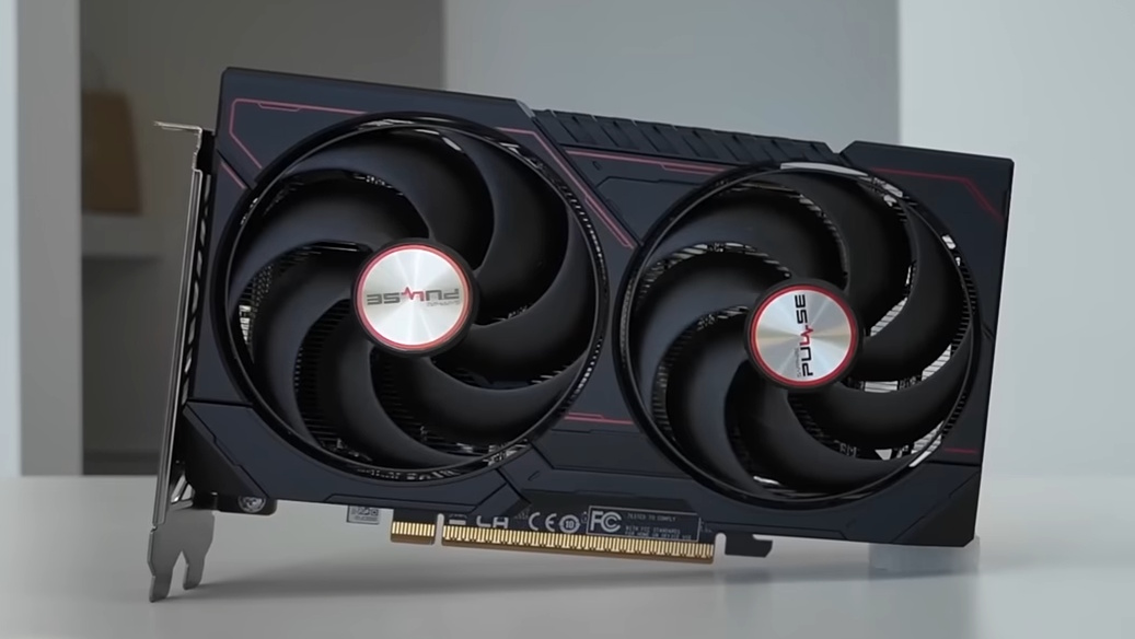 An RX 9060 non-XT graphics card on a desk
