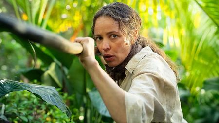 Rachel McAdams' Linda holding a wooden spear in the jungle in Send Help