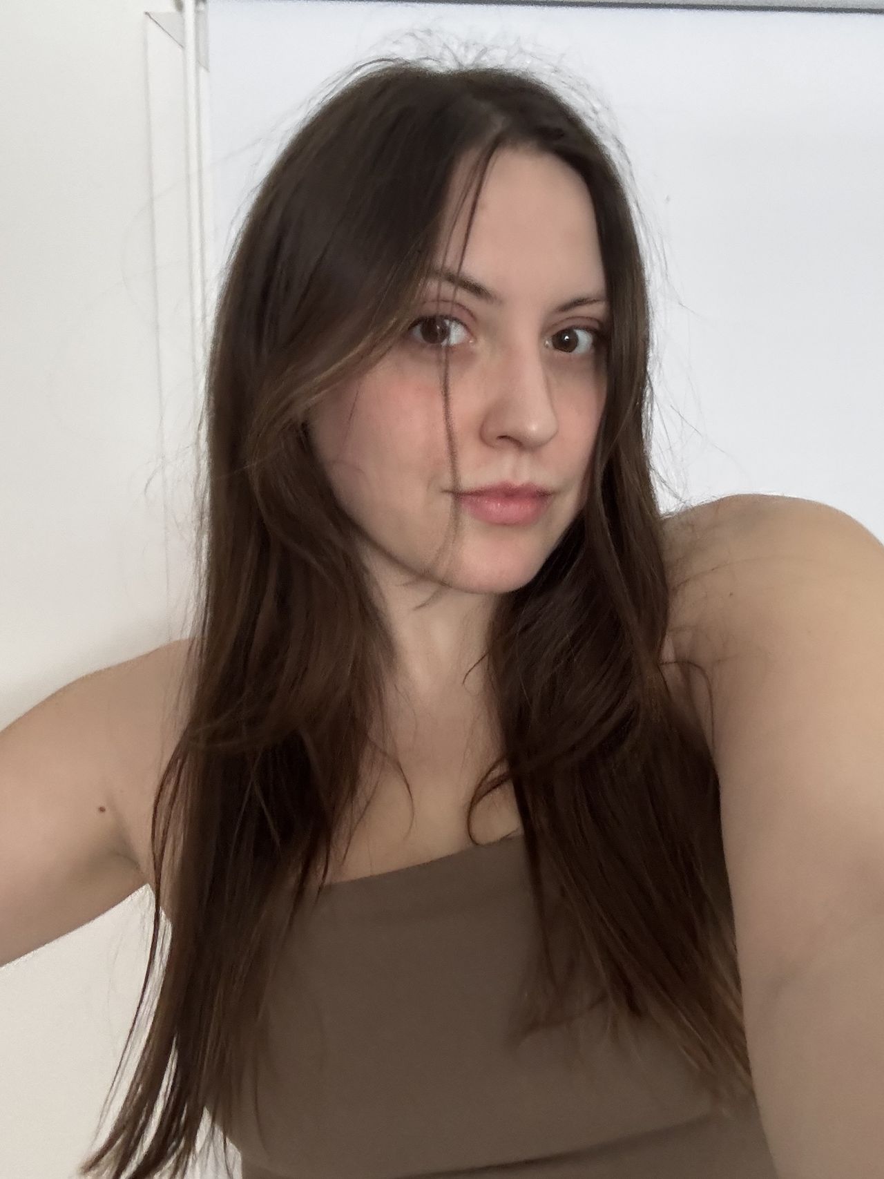 Sophia Vilensky shows off her silky hair after using Deborah Pagani Hair Serum.