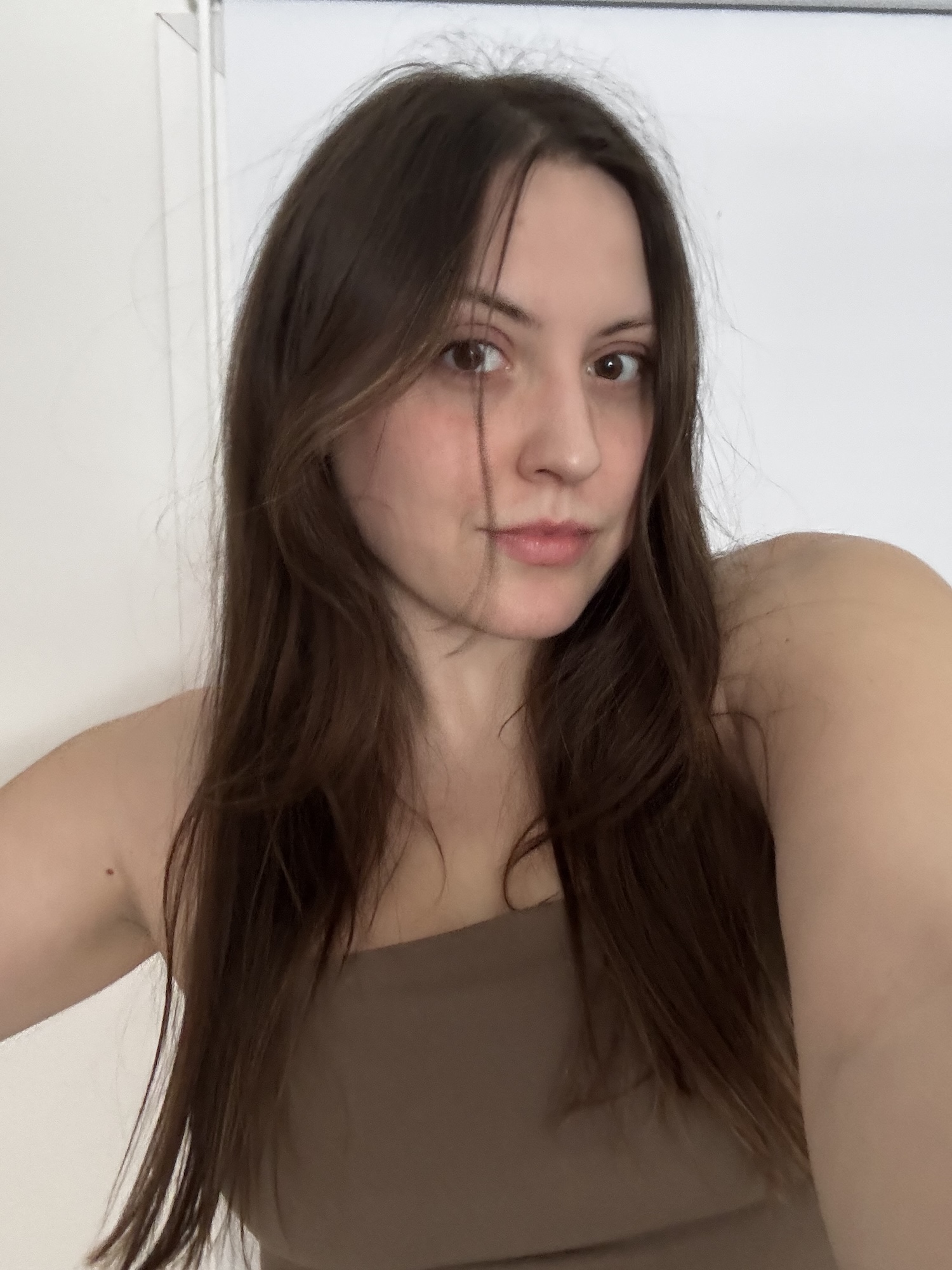 Sophia Vilensky shows off her silky hair after using Deborah Pagani Hair Serum.