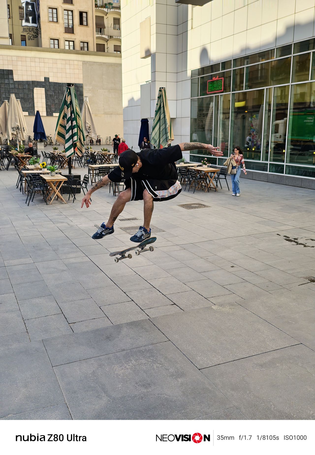 A skateboarder pulling a trick
