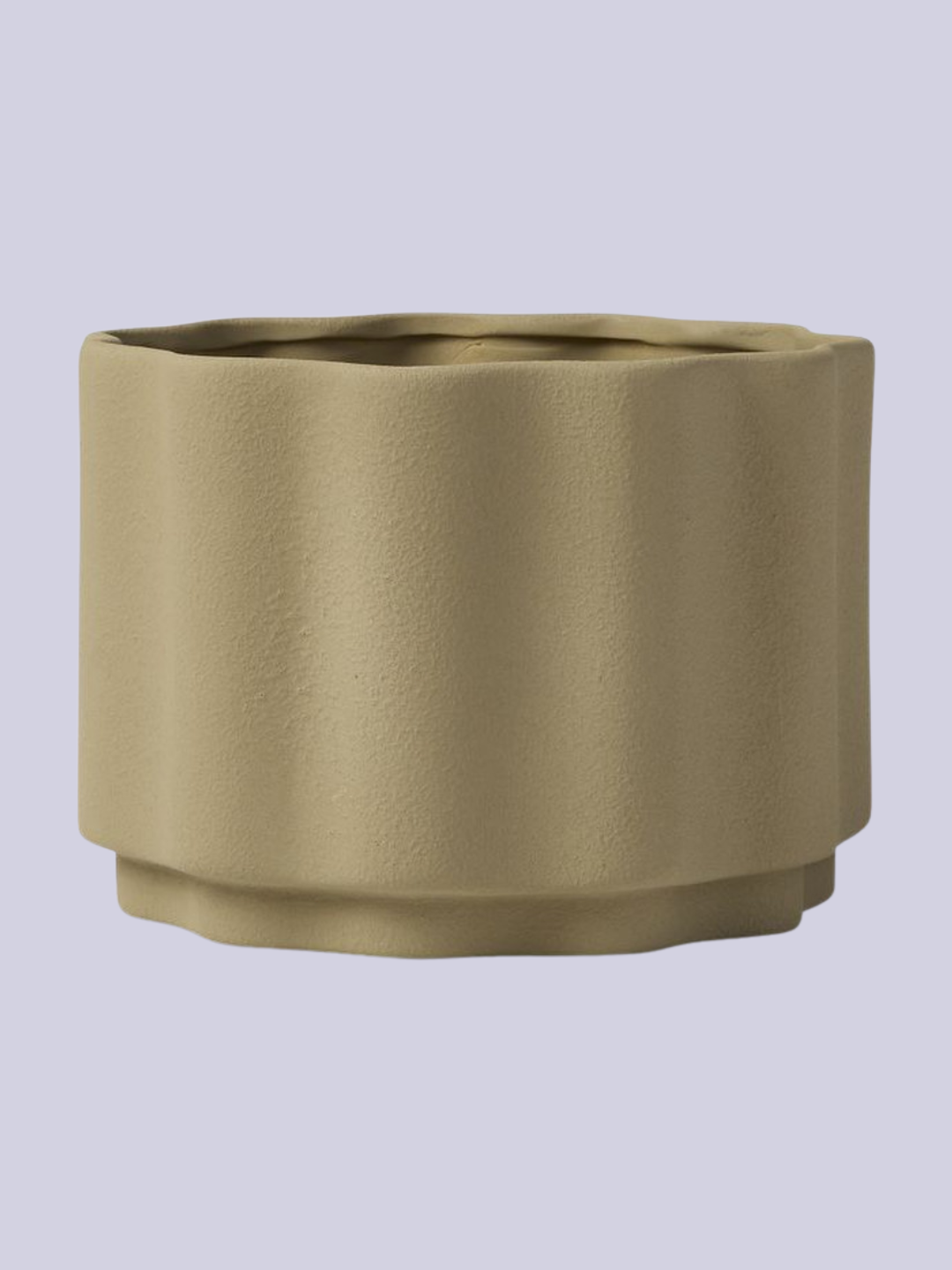 A wavy medium tabletop planter in moss green