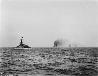 HMS CARDIFF leading German battle-cruisers into Rosyth, Scotland.