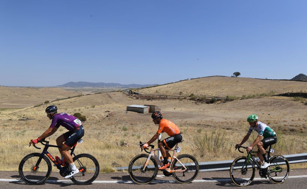 VILLANUEVA DE LA SERENA SPAIN AUGUST 27 LR Diego Rubio Hernandez of Spain and Team Burgos BH Luis ngel Mat Mardones of Spain and Team Euskaltel Euskadi and Alvaro Cuadros Morata of Spain and Team Caja RuralSeguros RGA compete during the 76th Tour of Spain 2021 Stage 13 a 2037km stage from Belmez to Villanueva de la Serena lavuelta LaVuelta21 on August 27 2021 in Villanueva de la Serena Spain Photo by Tim de WaeleGetty Images