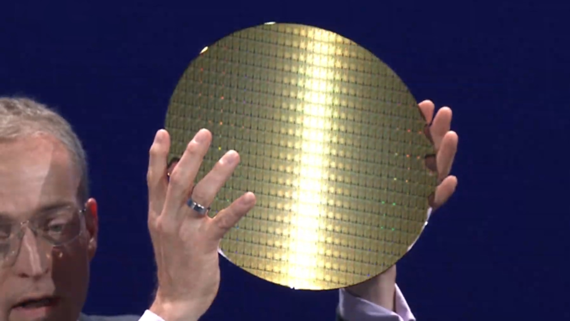 Intel CEO Pat Gelsinger holding a wafer at Computex 2024