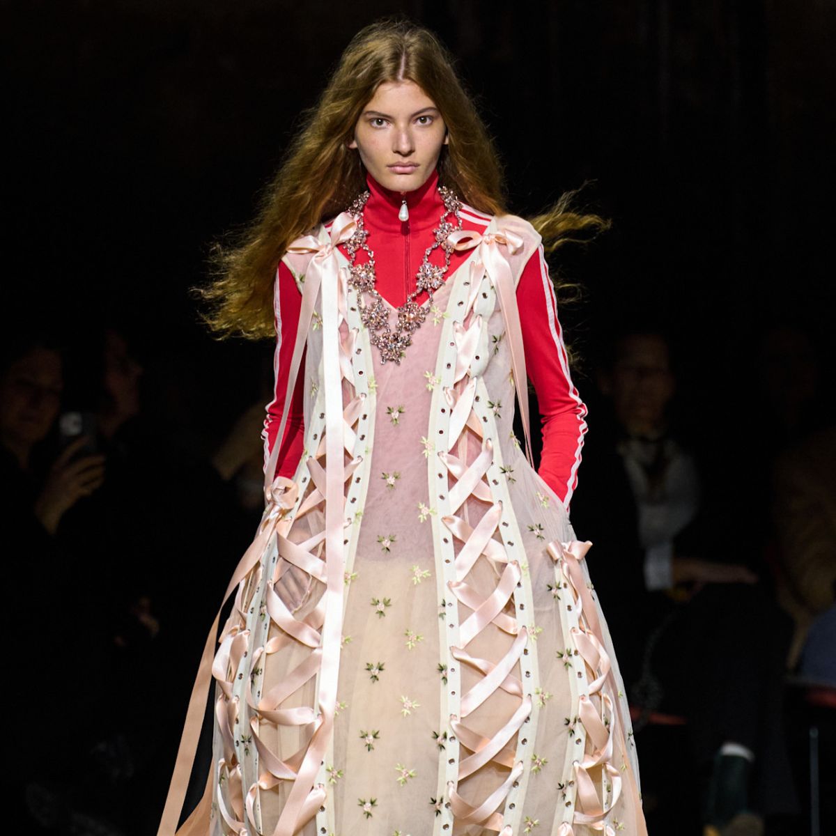 a model on the aw26 runway wearing voluminous clothes