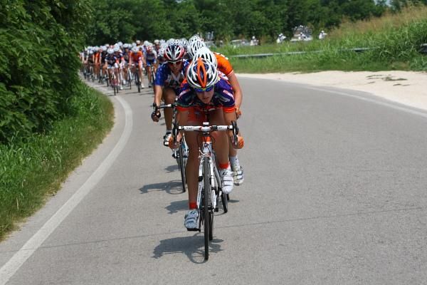 The bunch is strung out with 20km to go.