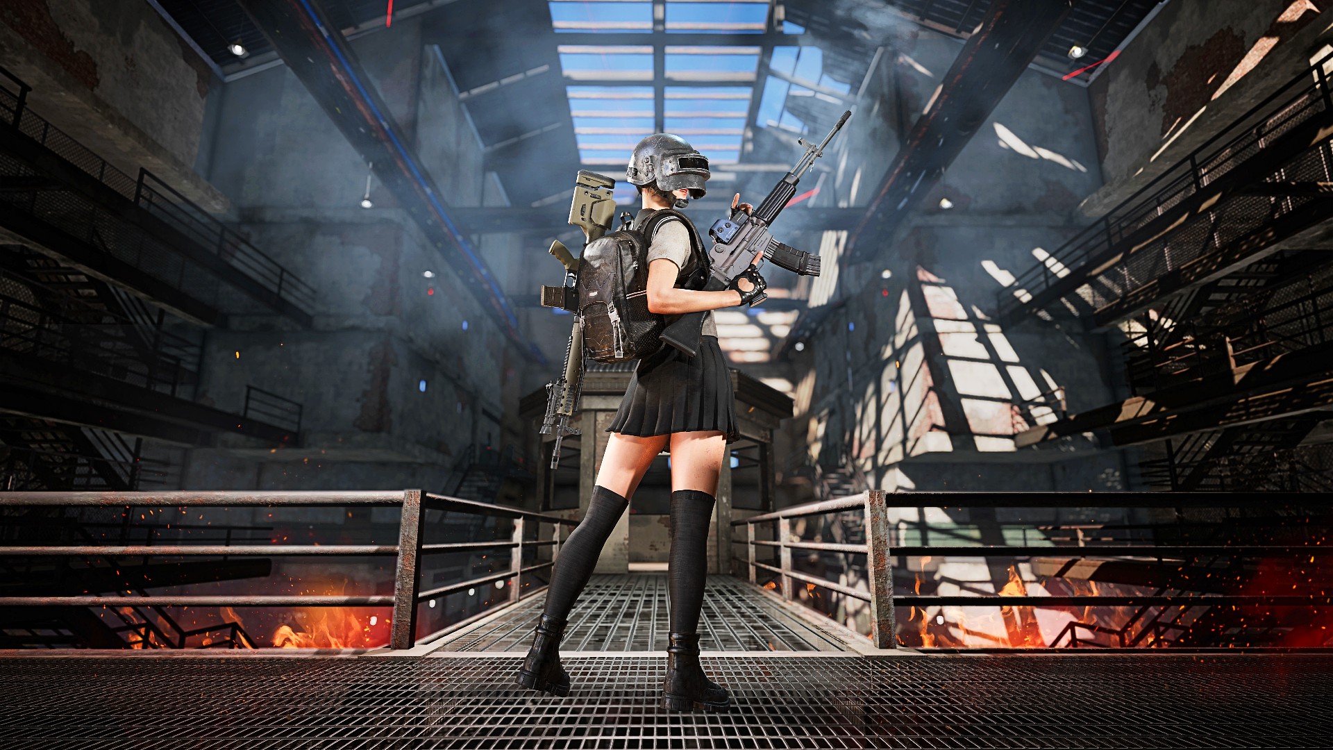 A PUBG player holds a gun while standing in a warehouse