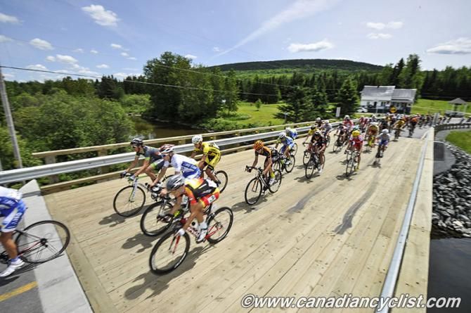 Peloton goes over a new bridge