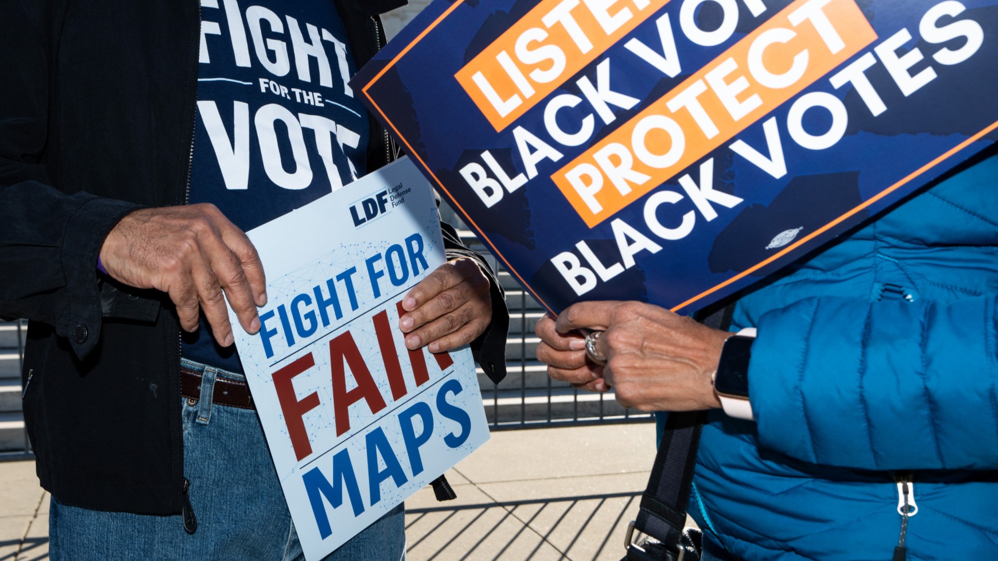 Voting rights activists gather outside the U.S. Supreme Court