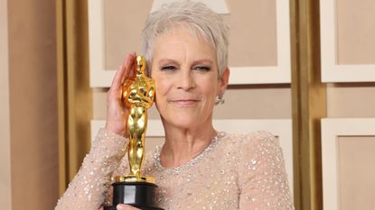 Jamie Lee Curtis' first ever Oscar win for ‘Everything Everywhere All at Once’. Seen here she poses with with Oscar statue