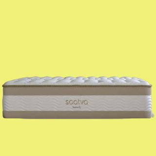 The Saatva RX, our best mattress for back pain, is photographed on a yellow background