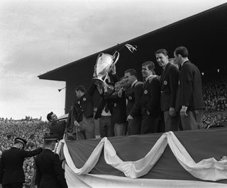Celtic players parade the European Cup at Celtic Park