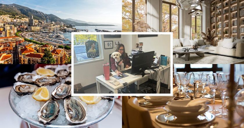 Footballer's concierge, Laura Wolfe, sits at her desk with a dog 