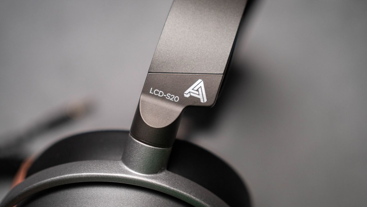 Audeze LCD-S20 planar headset against a grey craft sheet highlighting the product design