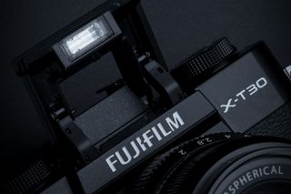 The X-T30 (above) boasts a built-in flash, whereas the X-T3 can only work with external units, such as the small EF-X8 option provided with it as standard. Image credit: Fujifilm