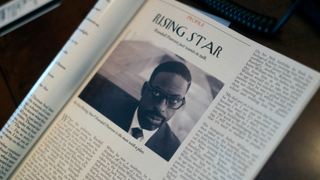 A cover story with Randall's photo is shown with the headline "Rising Star."