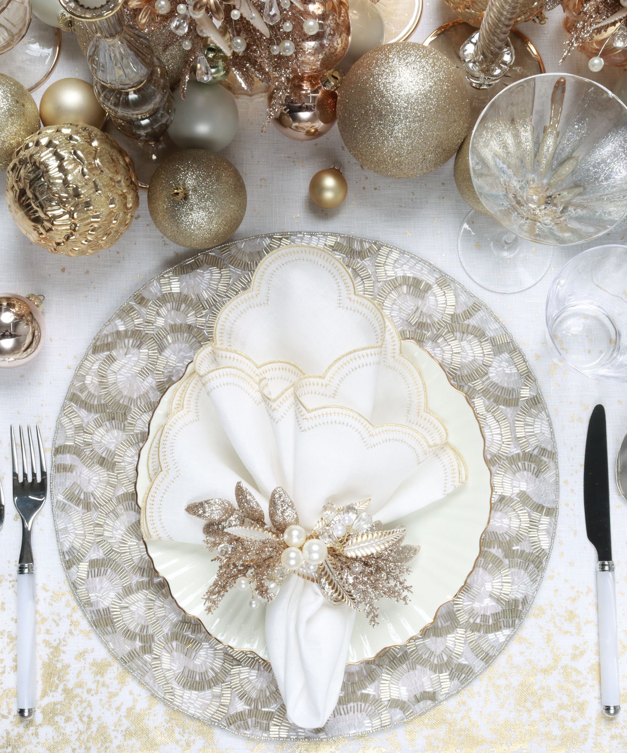 Metallic and white festive table setting