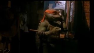 Michelangelo ordering a pizza in the 1990 Teenage Mutant Ninja Turtles movie