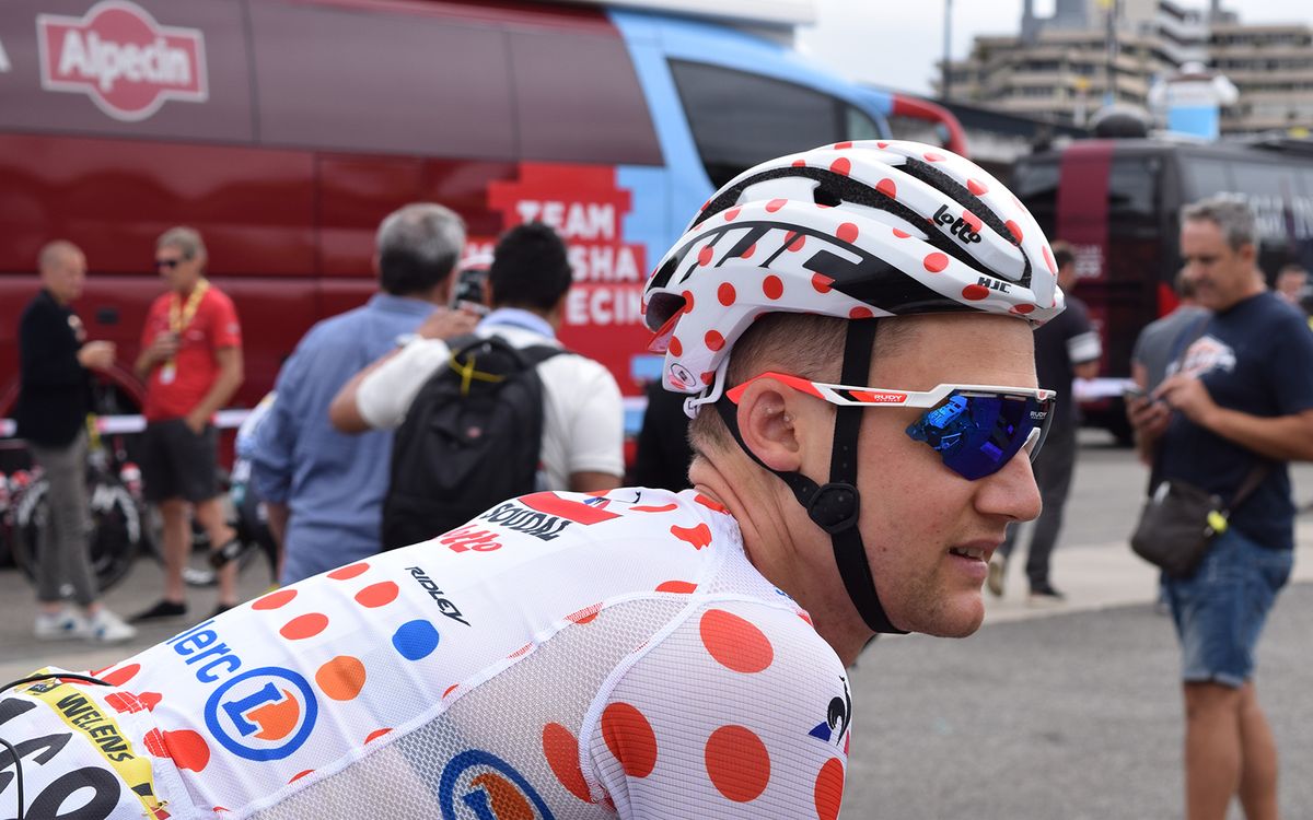 Lotto Soudal's Tim Wellens has a polka dot bike and helmet to match his jersey