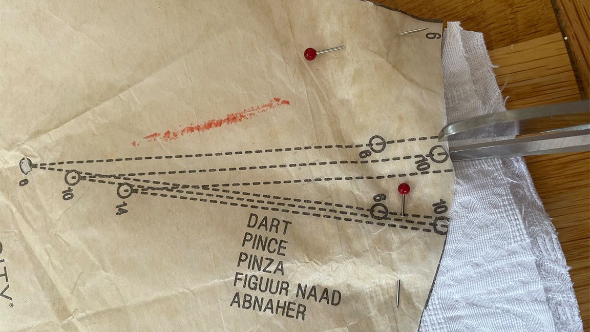 How to sew beginners; a sewing pattern paper and material