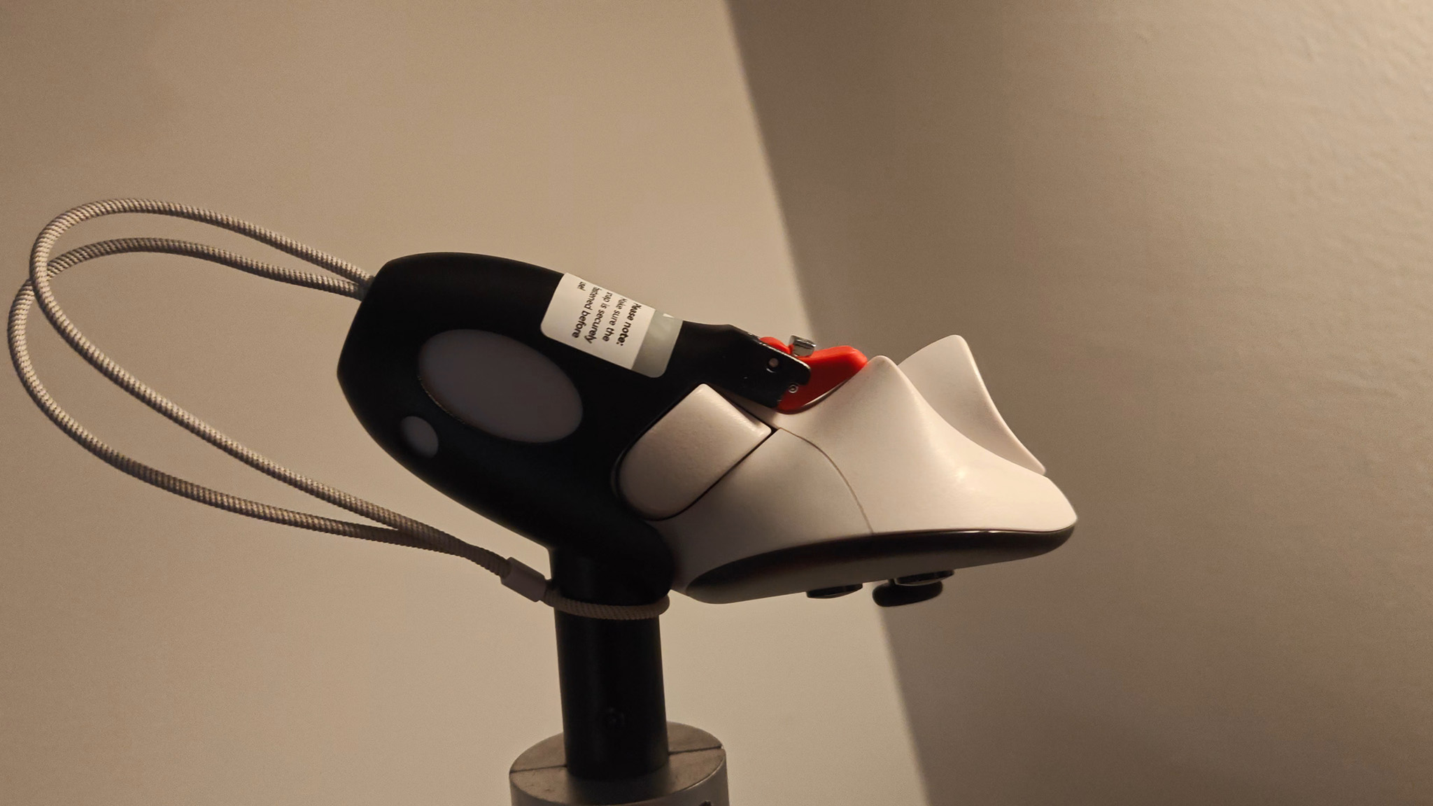 How the controller mounts to the AMVR haptic golf club accessory for Meta Quest 3 and 3S